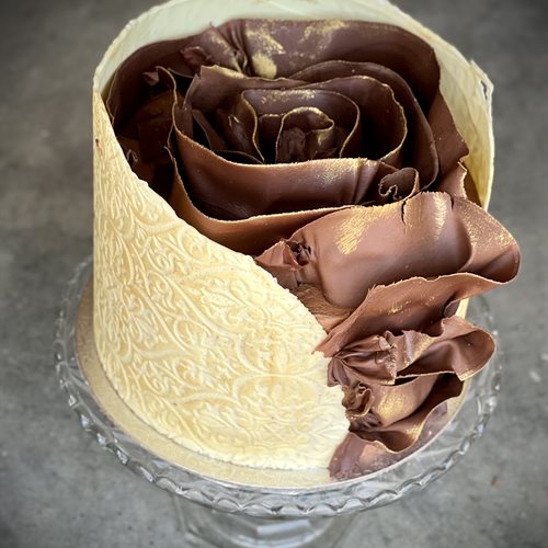 White and dark chocolate ribbon embrace